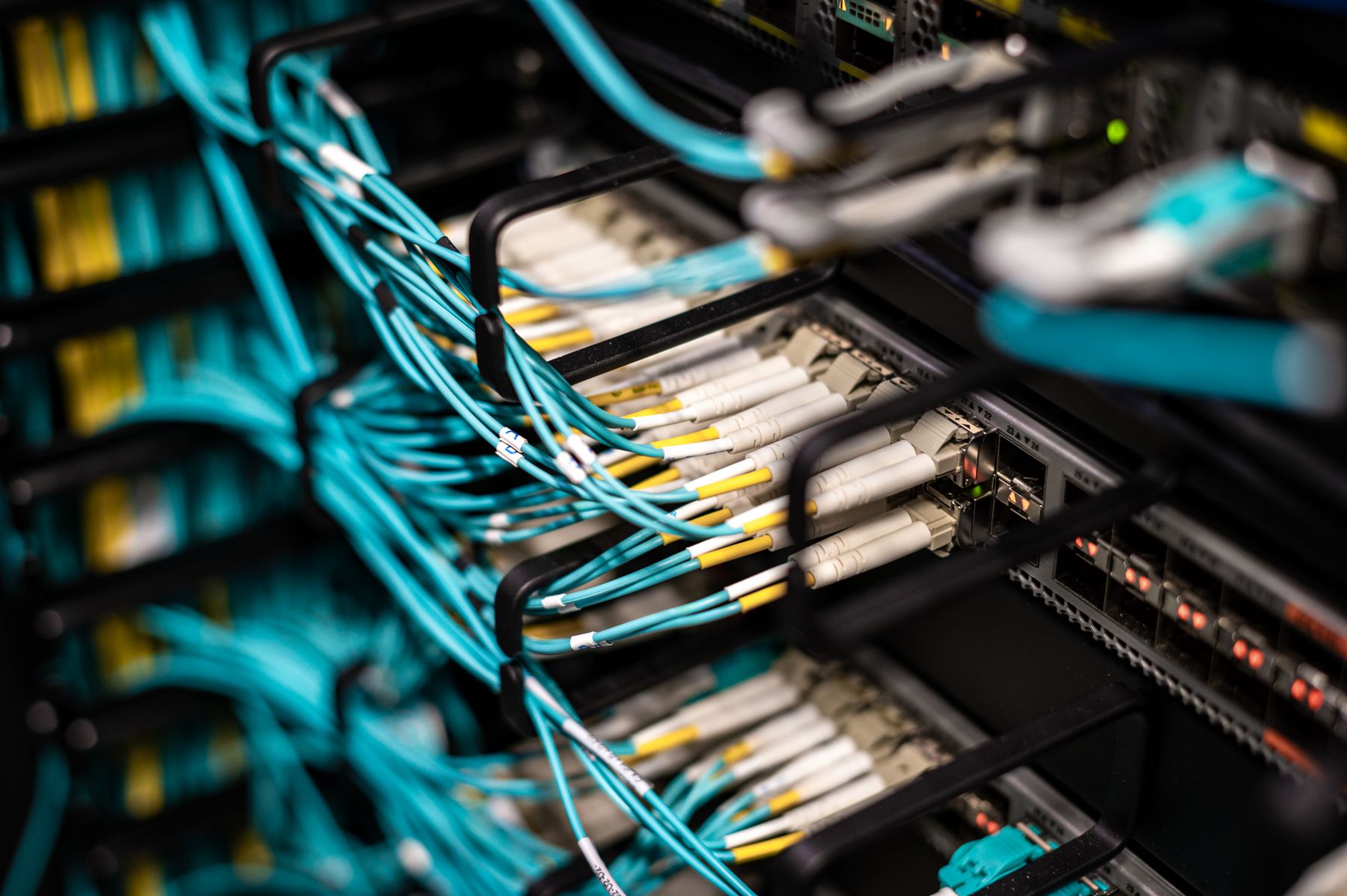 Organised fibre-optic connections on network equipment.